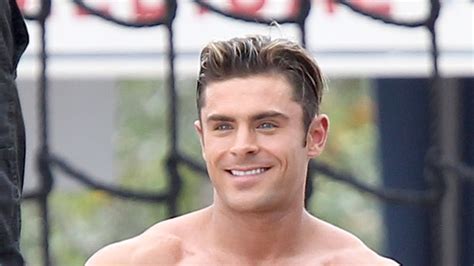 zac efron shows off his rock hard body nuzzles co star at baywatch shoot