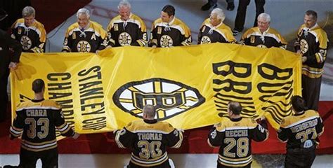 Boston Bruins Celebrate Championship Season As Banner Is Raised Into Td