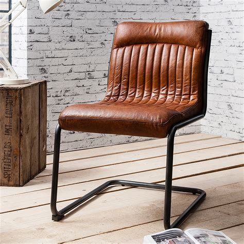 Iron swivel in polished steel ups the sleek factor. Docklands Leather Chair - Industrial Seating Collection ...