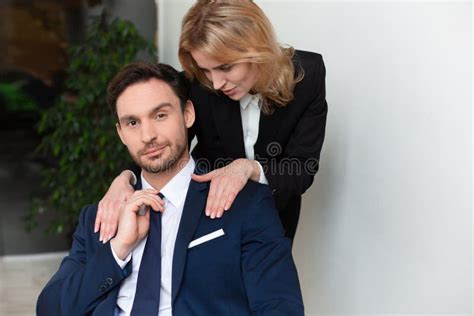 Beautiful Blond Woman Seducing Coworker At Office Banned Relations At Work Stock Image Image
