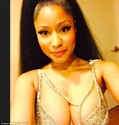 Nicki Minaj Puts Ample Cleavage On Display In A Series Of Sexy