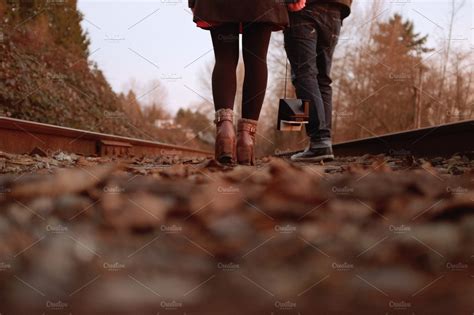 Couple Walking On Railway Tracks 2 High Quality People Images ~ Creative Market