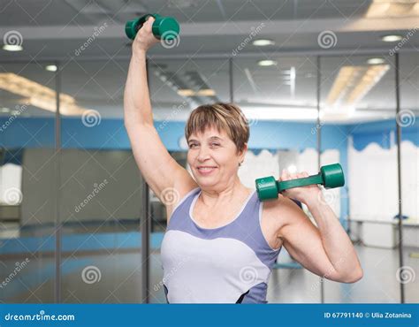 Pretty Senior Woman Exercising In Gym Stock Photo Image Of Person