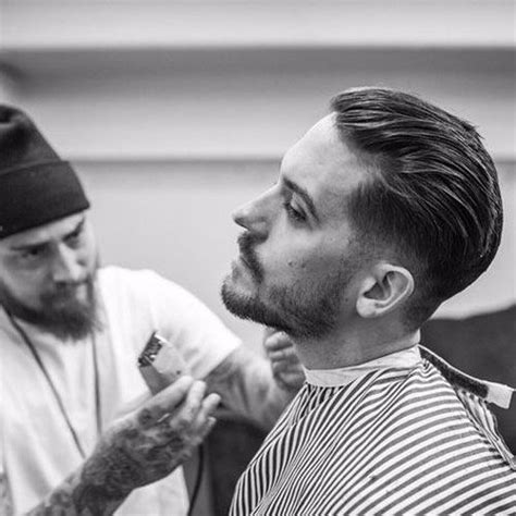 One side is blended and the other is blended but with an undercut as the top hangs over. G-Eazy Hairstyle | Men's Hairstyles Today | G eazy haircut ...