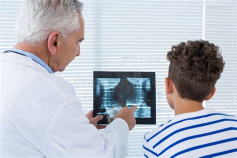 doctor discussing x ray report with patient stock image image of looking discussing 84087195