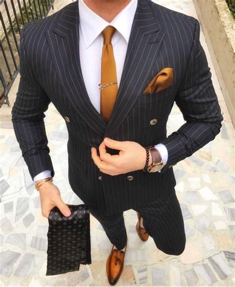 Many customers of men's warehouse find that they need to have their apparel tailored to get the perfect fit. Custom luxury tailored suit for Men | Slaylebrity