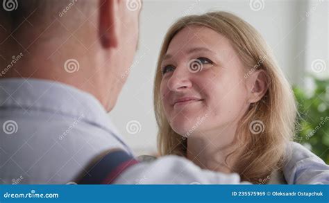 Married Couple Smiling Woman Lovingly Looks At Her Husband And Hugs Him Tightly Close Up Stock