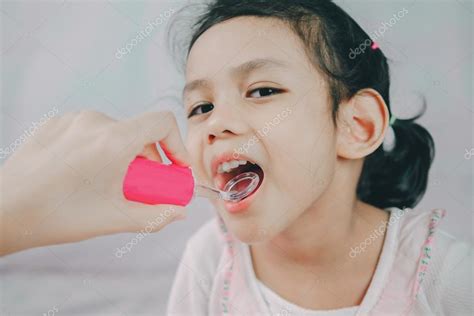 Open Mouth Of Asia Young Girl During Checking Tooth And By Dental