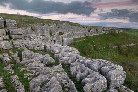 Limestone Cliffs Above Malham Cove In The Yorkshire Dales National Park