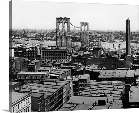 The Brooklyn Bridge Under Construction Over The East River In New York