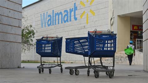 Walmart Shares Slump After Retailer Cuts Profit Outlook On Inflation