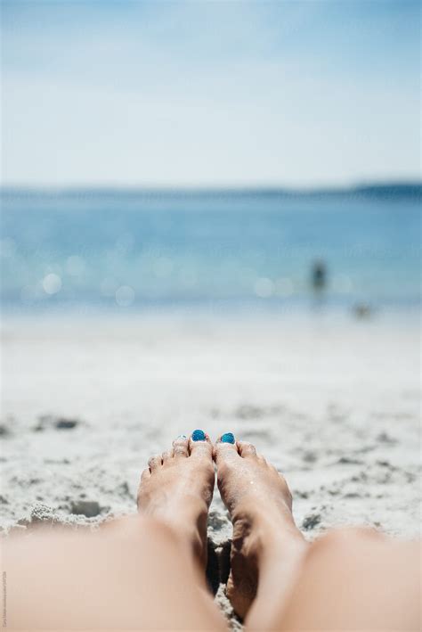 Woman S Legs On A Sandy Beach In Summer By Stocksy Contributor Cara