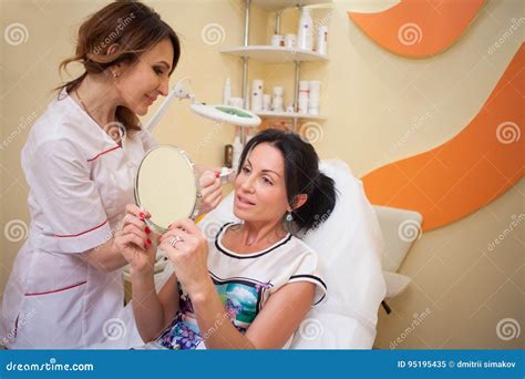 Cosmetology Spa Doctor And Patient Treatment Of Persons Stock Image
