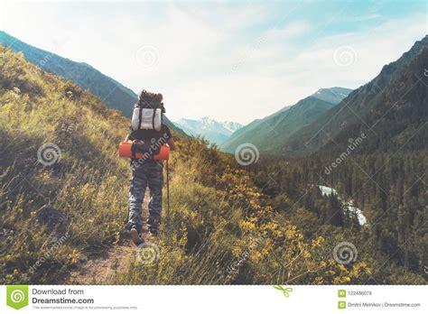 Tourist With Hiking Backpacks In Mountain Hike On Summer Day Tourist