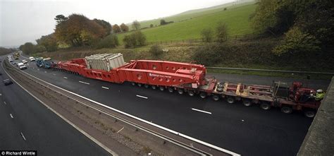 biggest ever load transported on britain s roads weighing more than a space shuttle crawls to