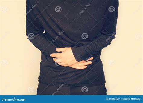 Young Man Having A Stomachache Abdominal Pain A Man Holds A Big Belly