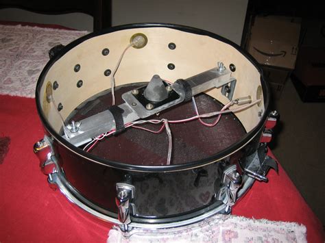 It's cheap, i spent under 5 bucks for the piezo, the jack and the wire. Inchoate Thoughts - Acoustic to Electric Drum Conversion