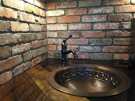 This is a great way to create some farmhouse type. Baltimore Brick Veneer reclaimed backsplash. | Thin brick veneer, Thin brick, Stone farms