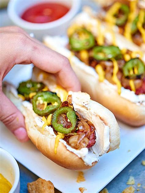 Swiss cheese and barbecue sauce put a delicious twist on the usual hot dog in this recipe — and to rave reviews! Seattle Hot Dog Recipe - w/ Bacon Cream Cheese & Chips