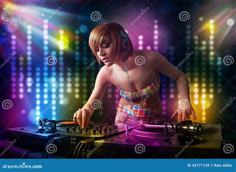 Dj Girl Playing Songs In A Disco With Light Show Stock Image Image Of Musical Headphones