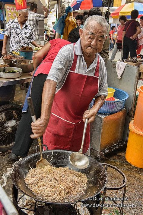 Penang is the food capital of south east asia and is paradise for any foodie due to its diverse array of cuisines and flavours. cooking stir fried noodles in a wok in Penang, Malaysia ...