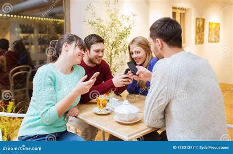 Group Of Friends With Smartphones Meeting At Cafe Stock Image Image
