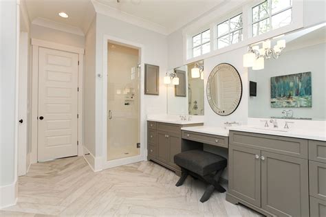 Master Bath Featuring His And Her Vanities Herringbone Floors And Shower Custom Home Builders