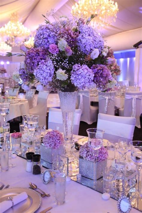 Create a magical wedding with 50+ purple and silver wedding color ideas. Light Purple Wedding Centerpieces