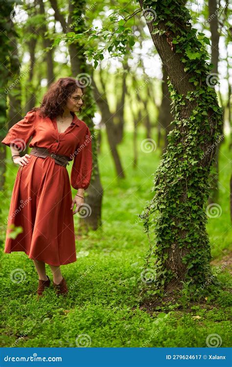 candid of a mature curly hair redhead woman stock image image of female people 279624617