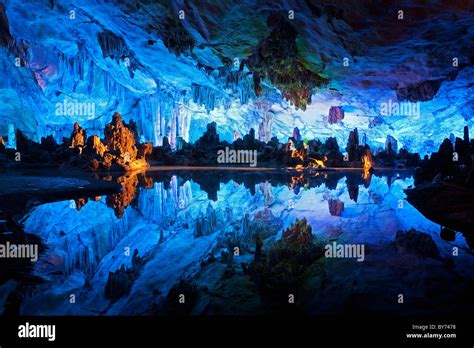 The Beautifully Illuminated Reed Flute Caves Displaying The Crystal