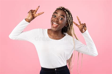 Black Woman Showing Two Victory Sign Or Peace Gesture Stock Image