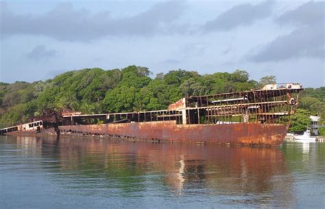 Partially Submerged Shipwreck In Roatan Honduras Submechanophobia
