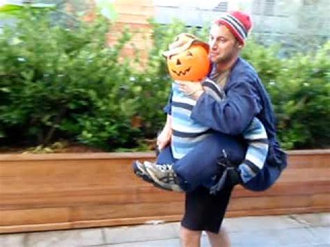 Riding on the shoulders of a first grader, riding on the back of an old woman, and being carried by a zombie! my weird costume - YouTube