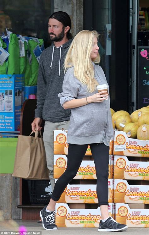 Pregnant Leah Jenner Shows Off Baby Bump In Sweats With Husband Brandon