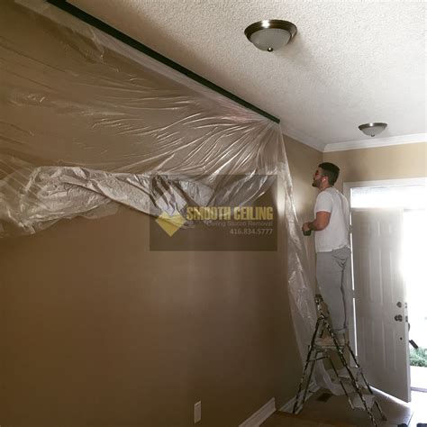 Removing the painted popcorn ceiling. Before & After Popcorn Ceiling Removal (Video) - The ...