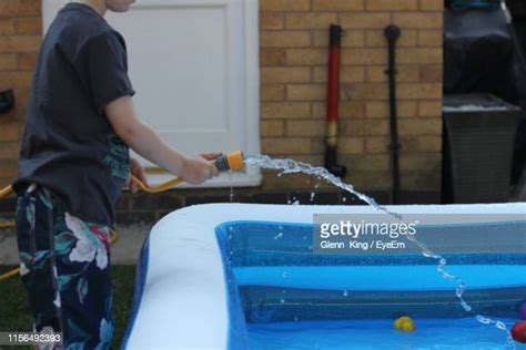 Filling Swimming Pool Photos And Premium High Res Pictures Getty Images