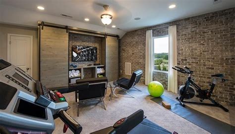 A Home Gym With Exercise Equipment And An Exercise Ball In The Middle