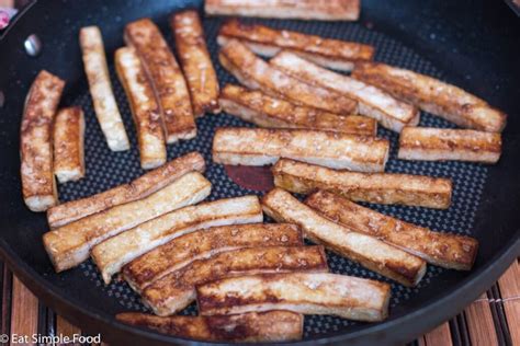 Drizzle with olive oil, and toss until evenly coated. This extra firm tofu recipe is sliced and marinated in ...