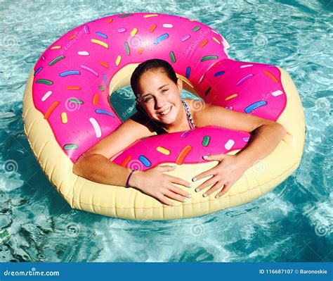 Girl In Donut Float In Pool Stock Image Image Of Summer Pool 116687107