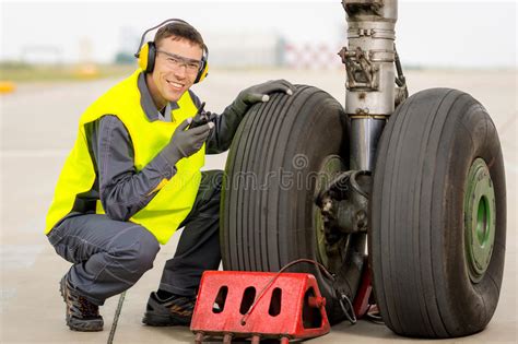 Airport Worker Mechanic Stock Photo Image Of Caution 98415230