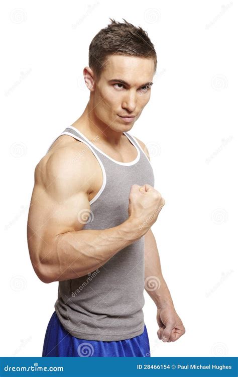 Muscular Man Flexing His Biceps Royalty Free Stock Photo