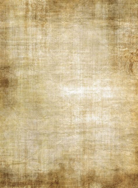 An Old And Worn Brown Parchment Paper Background Myfreetextures