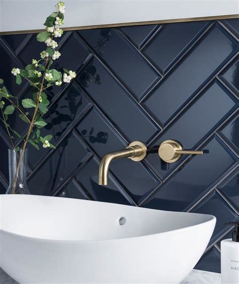 Sophisticated Splashback With Dark Navy Blue Tiles Laid In A Herring