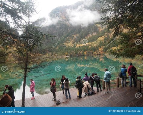 Scenic Place Draws Photo Session Amongst Tourists At Jiuzhaigou