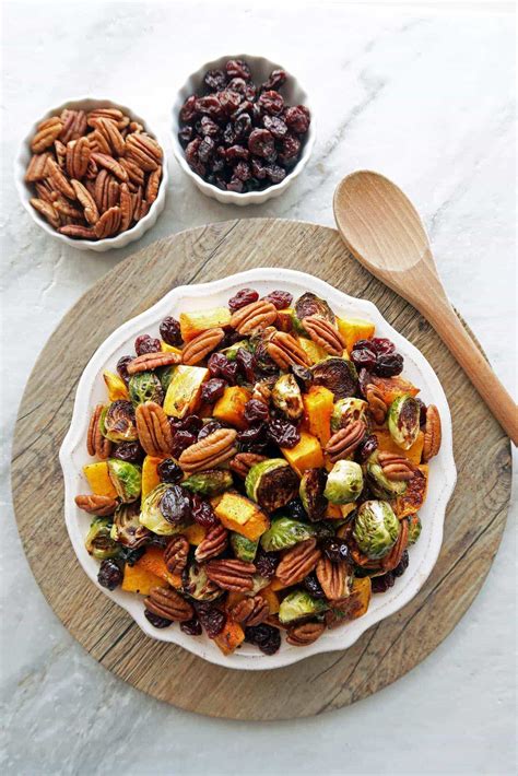 Roasted Butternut Squash And Brussels Sprouts With Pecans And Dried
