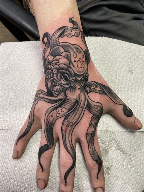 Octopus done by Amber at Rock-A-Billy in Murphy North Carolina : r/tattoos