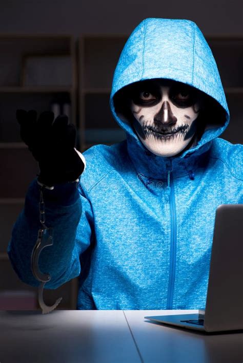 The Scary Hacker Hacking Security Firewall Late In Office Stock Image
