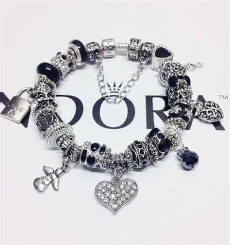 An Authentic Black And Silver Pandora Charm Bracelet By Eurodazzle