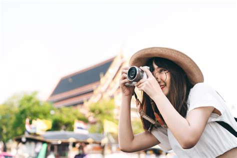 Young Asian Cute Woman Traveling In Bangkok And Take Photo With Camera