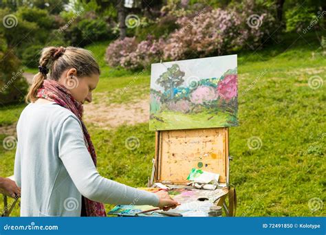 Female Artist Working Outdoors In The Park Stock Photo Image Of Color